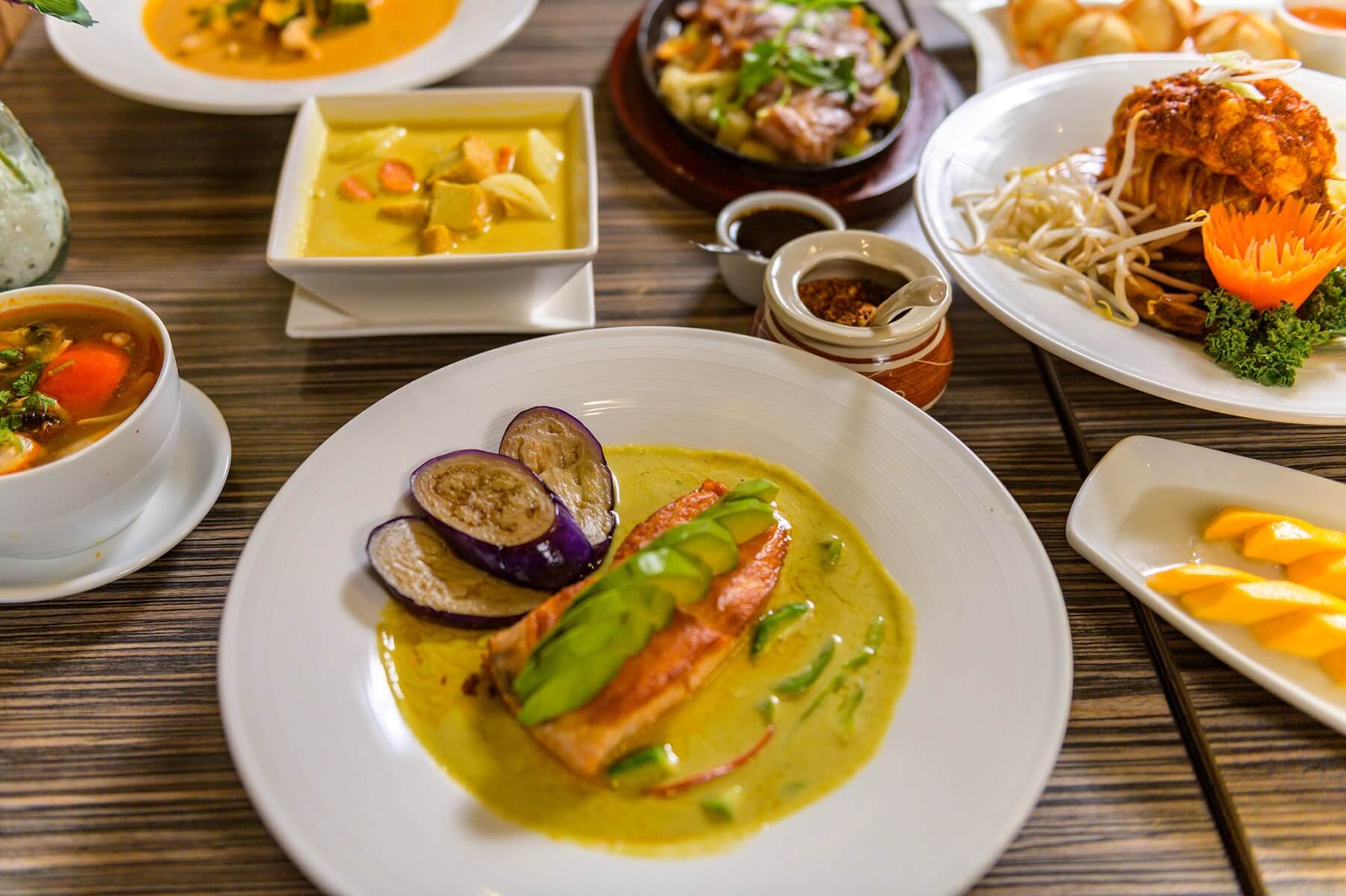 Chef preparing fresh Thai dishes in La Jolla